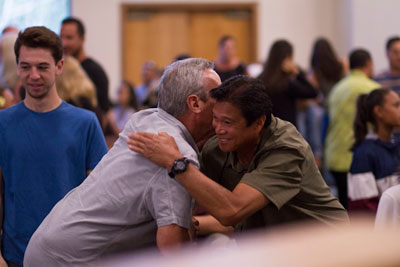 The Other Six - Faith Lutheran Church, Wesley Chapel, FL - People passing the peace of Jesus