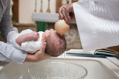 The Other Six - Faith Lutheran Church, Wesley Chapel, FL - Baby being baptized