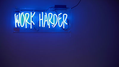 Daily Devotion - Faith Lutheran Church, Wesley Chapel, FL - Work Harder sign