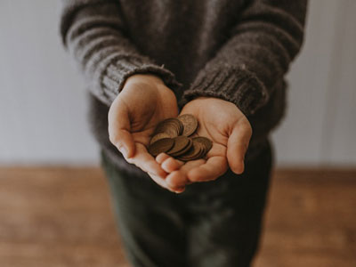 The Other Six - Faith Lutheran Church, Wesley Chapel, FL - Generous person holding out coins