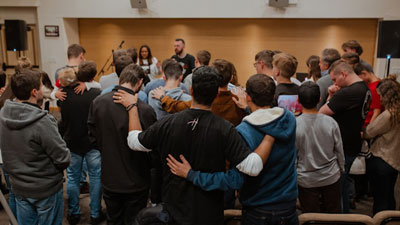 Daily Devotion - Faith Lutheran Church, Wesley Chapel, FL - People worshiping together in church