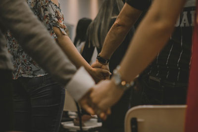 Daily Devotion - Faith Lutheran Church, Wesley Chapel, FL - Holding hands in church