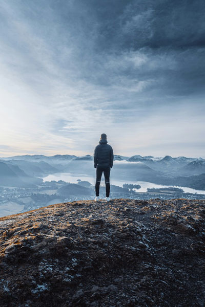 Daily Devotion - Faith Lutheran Church, Wesley Chapel, FL - Man standing on a mountain