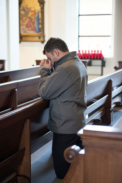 Daily Devotion - Faith Lutheran Church, Wesley Chapel, FL - Man confessing his sins in church